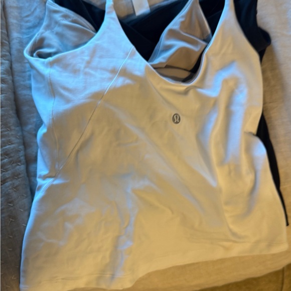 Two tops black and white lululemon Align™ Waist-Length Cami Tank Top
A/B Cup - Picture 3 of 4